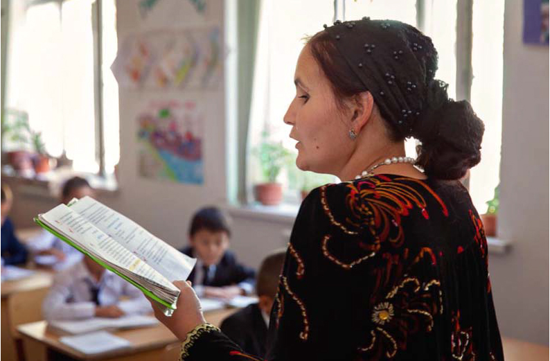 Tajik teacher reading to class