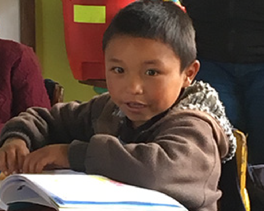 Image of boy in Guatemala classroom