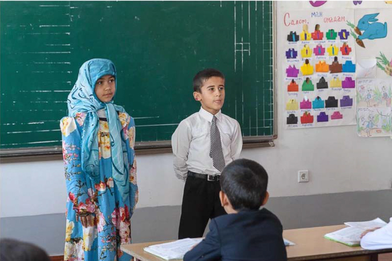 Tajik students at chalkboard
